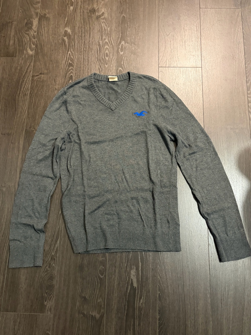 Hollister Men's Gray V-Neck Sweater with Blue Logo